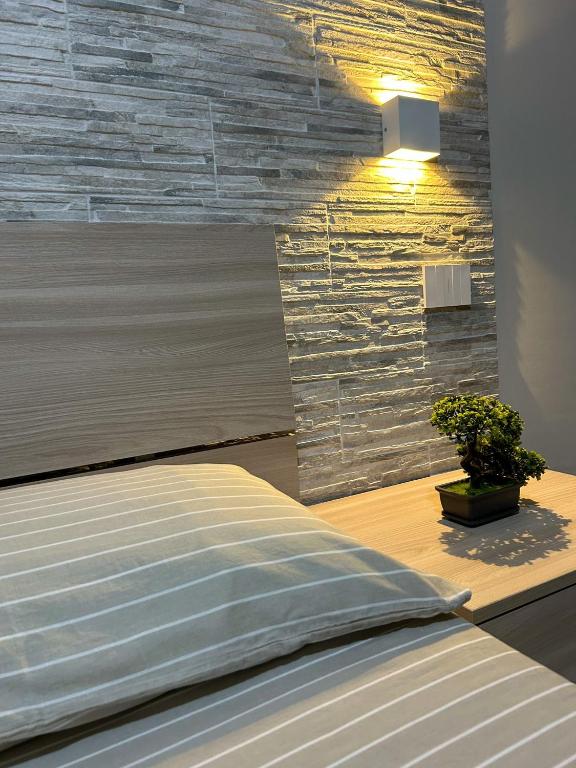 Postel nebo postele na pokoji v ubytování CAMARDA SUITE