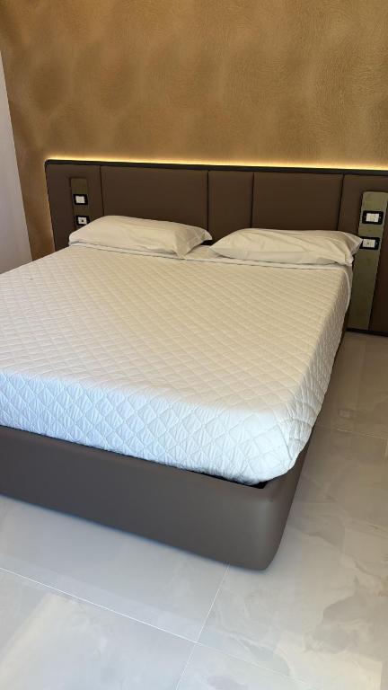 Postel nebo postele na pokoji v ubytování Hotel Kursaal