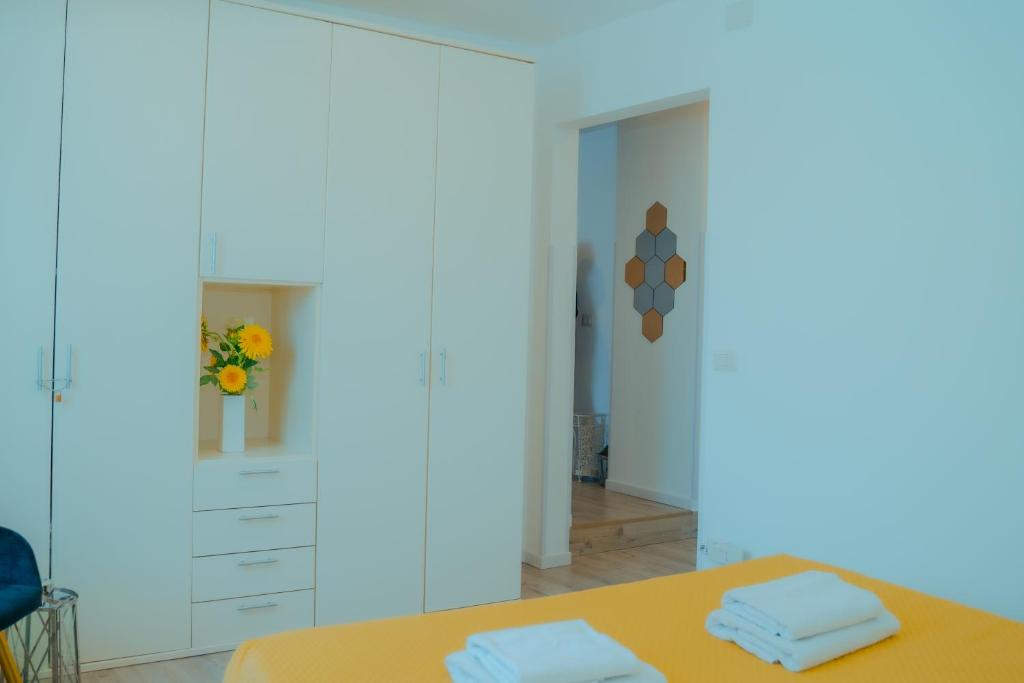 Łóżko lub łóżka w pokoju w obiekcie Casa Sorriso