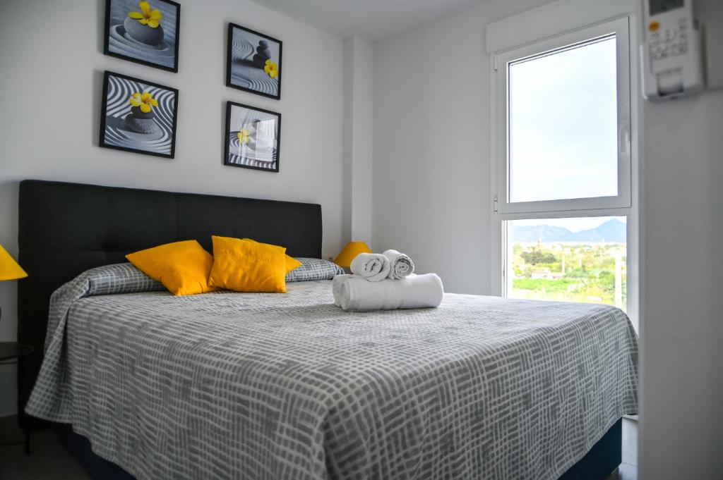 Ένα ή περισσότερα κρεβάτια σε δωμάτιο στο AT Gregal IV