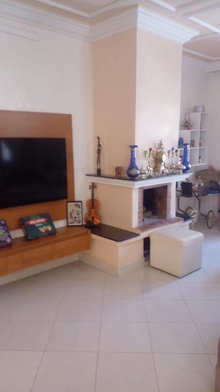 TV a/nebo společenská místnost v ubytování Calm Cosy Villa