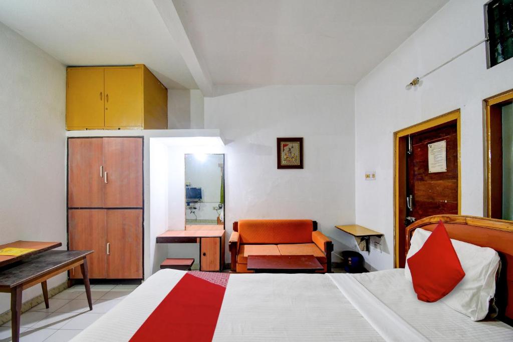 Postel nebo postele na pokoji v ubytování HOTEL O Upasana