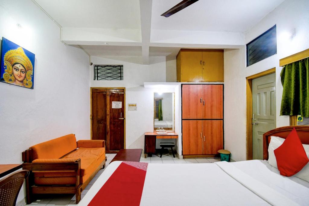 Postel nebo postele na pokoji v ubytování HOTEL O Upasana