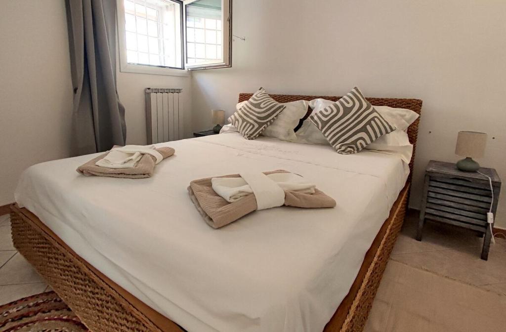 En eller flere senge i et værelse på Al Cortiletto Bed&Bike