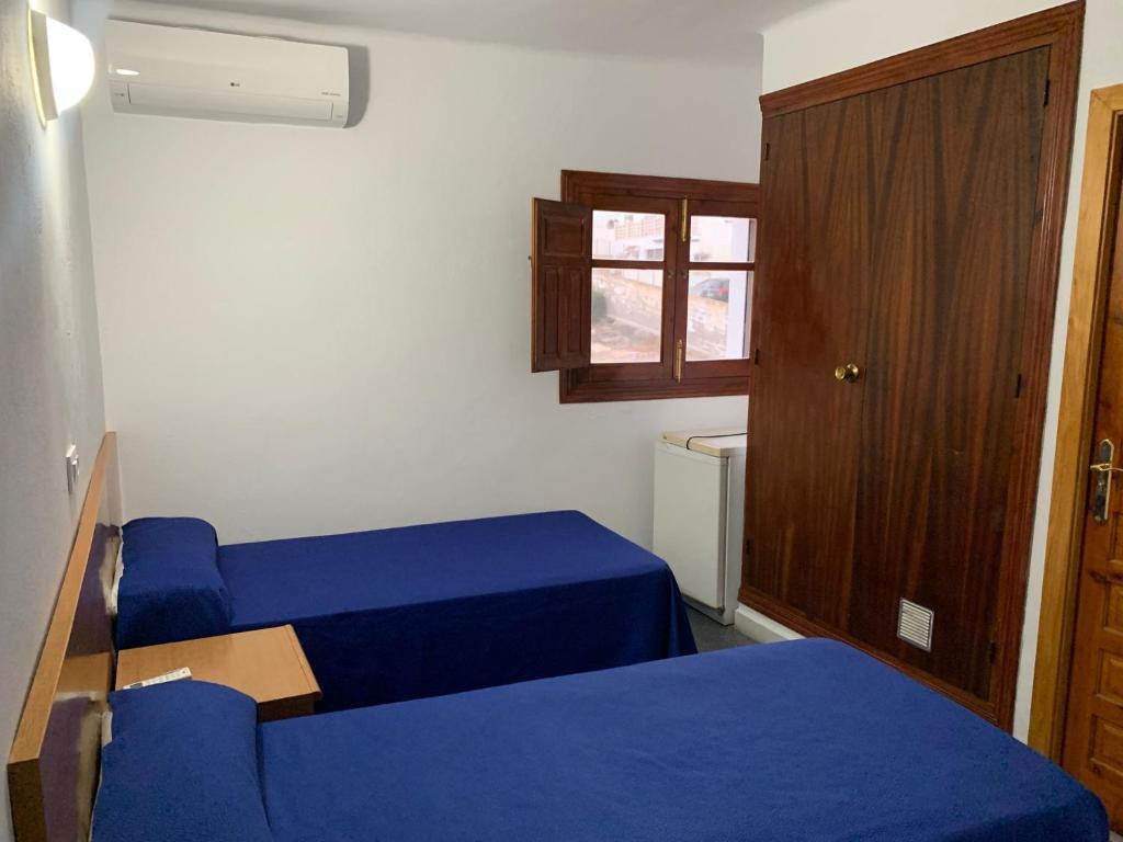 Postel nebo postele na pokoji v ubytování Hotel Playa
