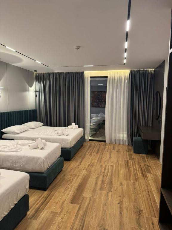 Postel nebo postele na pokoji v ubytování Hotel Lili-1