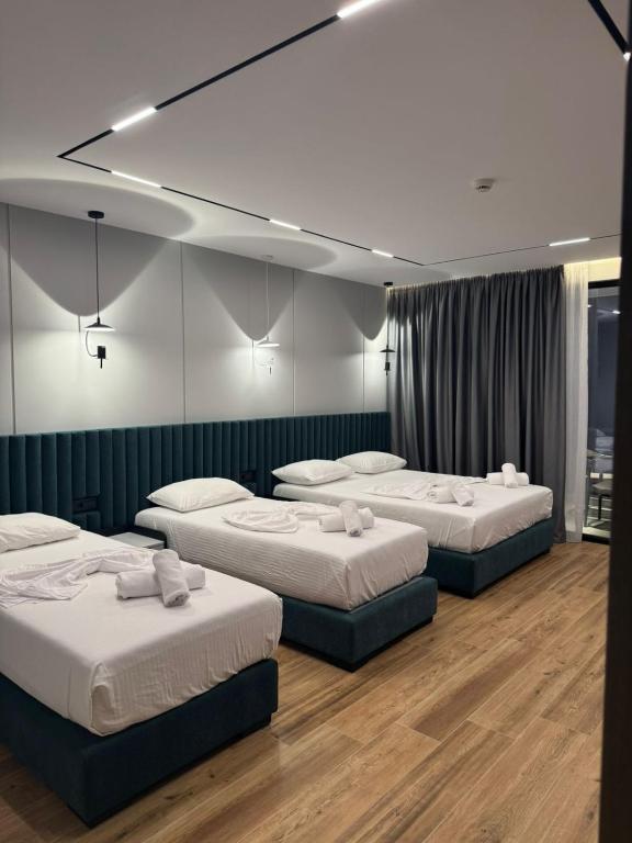 Postel nebo postele na pokoji v ubytování Hotel Lili-1