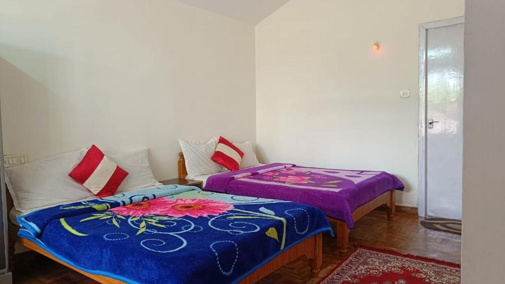 En eller flere senge i et værelse på Vi stays