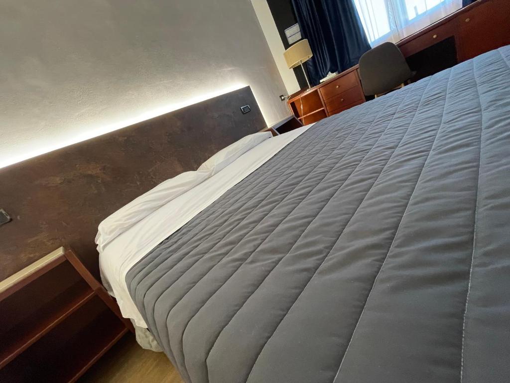 Postel nebo postele na pokoji v ubytování Hotel Sirena - B&B