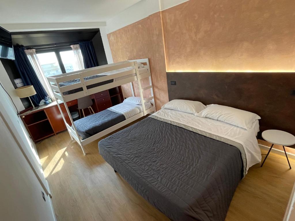 Postel nebo postele na pokoji v ubytování Hotel Sirena - B&B