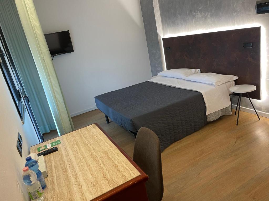 Postel nebo postele na pokoji v ubytování Hotel Sirena - B&B