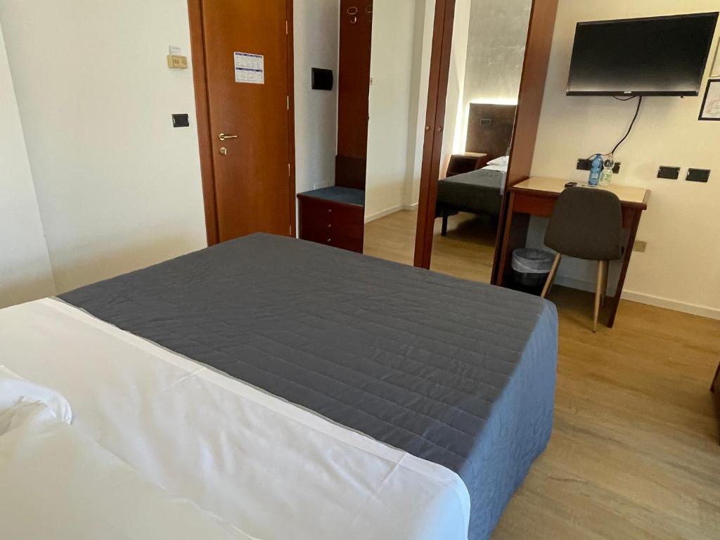 Postel nebo postele na pokoji v ubytování Hotel Sirena - B&B