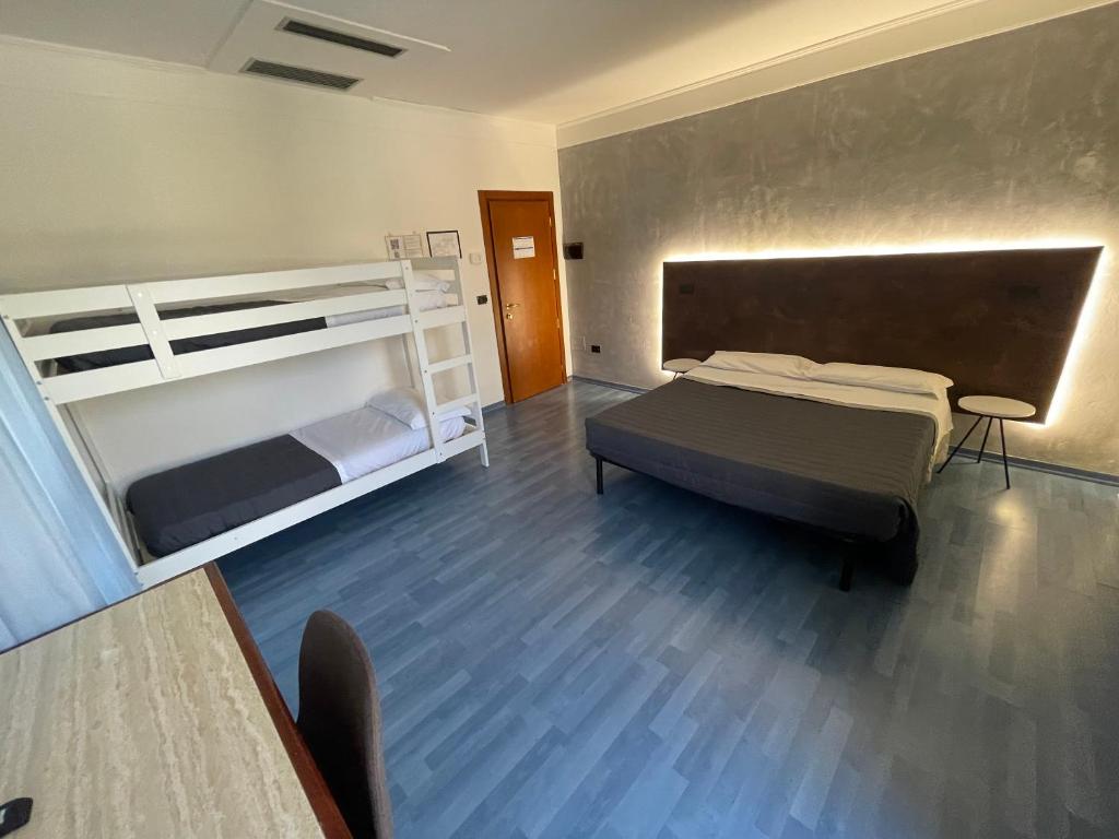 Postel nebo postele na pokoji v ubytování Hotel Sirena - B&B