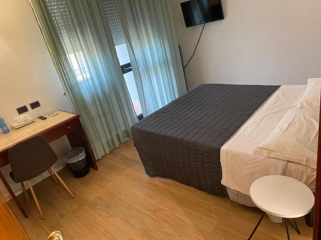 Postel nebo postele na pokoji v ubytování Hotel Sirena - B&B