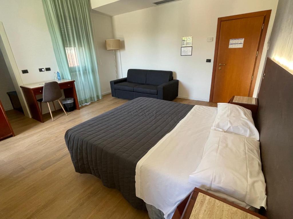 Postel nebo postele na pokoji v ubytování Hotel Sirena - B&B