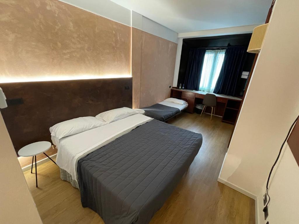 Postel nebo postele na pokoji v ubytování Hotel Sirena - B&B