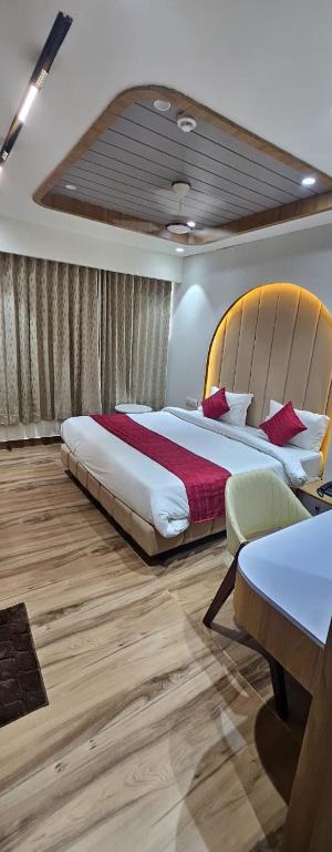 Postel nebo postele na pokoji v ubytování Hotel Prince Stays