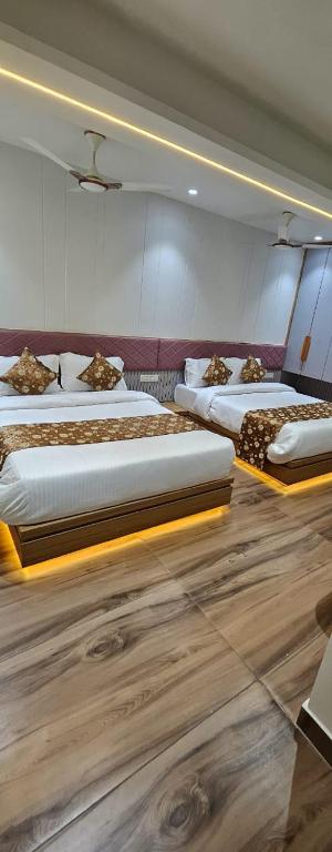 Postel nebo postele na pokoji v ubytování Hotel Prince Stays