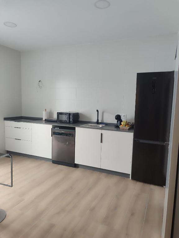 Kuchyň nebo kuchyňský kout v ubytování Piso céntrico en Moguer