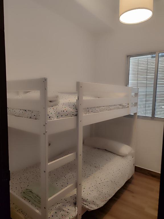 Postel nebo postele na pokoji v ubytování Piso céntrico en Moguer