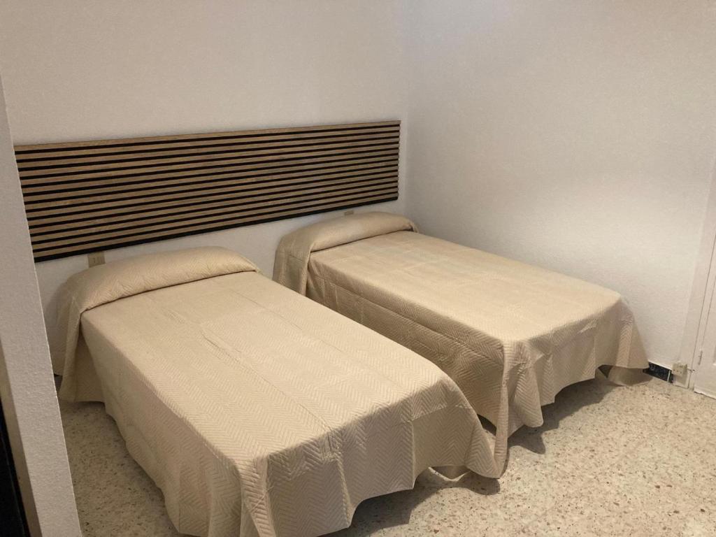 Postel nebo postele na pokoji v ubytování Piso céntrico en Moguer