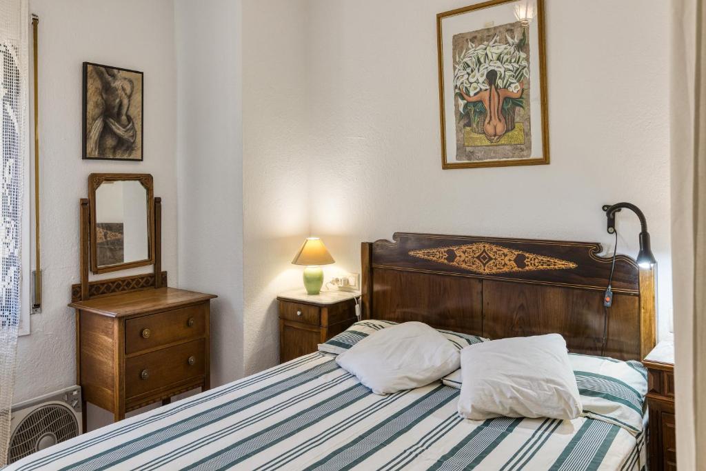 Posteľ alebo postele v izbe v ubytovaní Casa en urb Cala Montgó