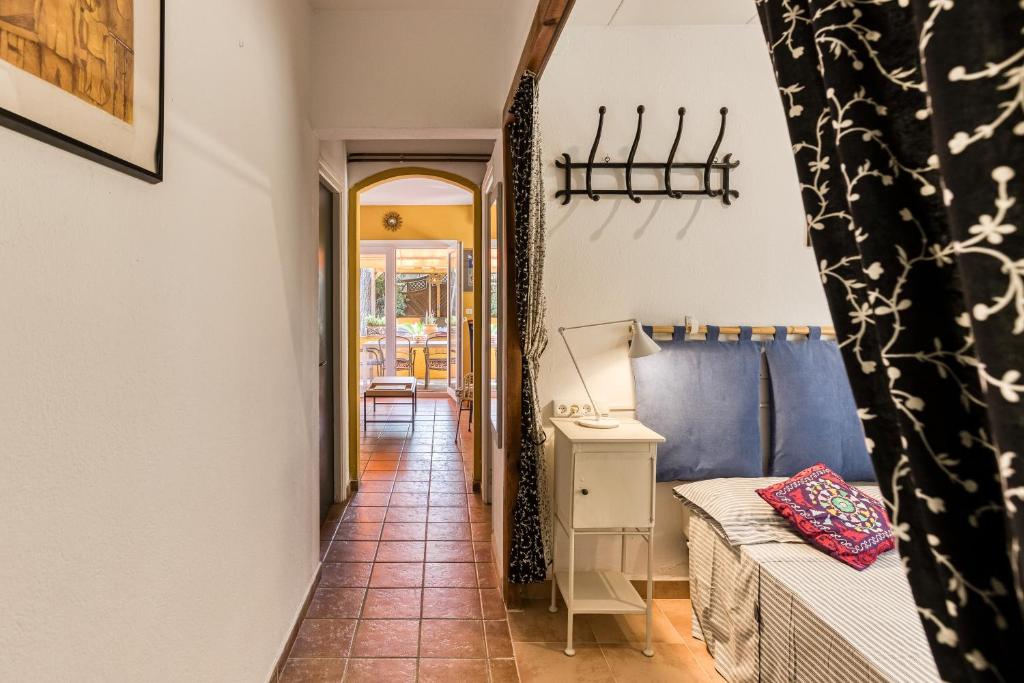 Posteľ alebo postele v izbe v ubytovaní Casa en urb Cala Montgó