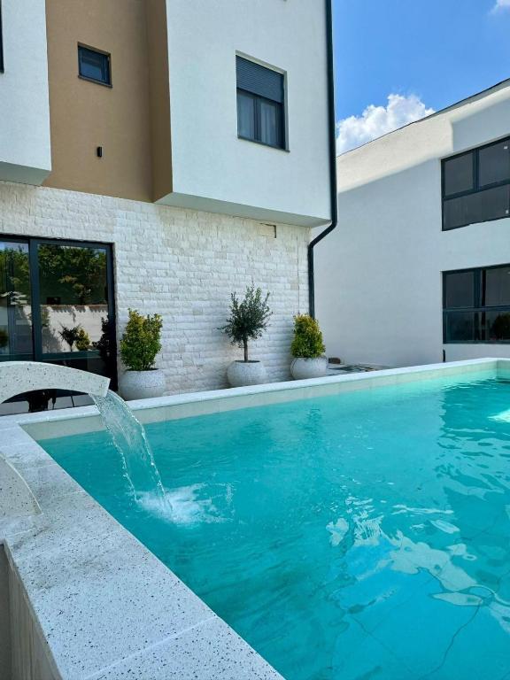 Bazén v ubytování POOL RESORT- Vila Lena- Studio 3 nebo v jeho okolí