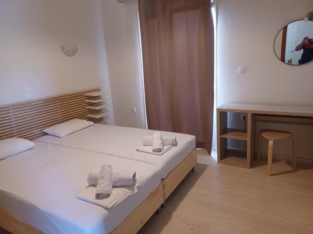 Postel nebo postele na pokoji v ubytování Tassos & Marios Apartments I