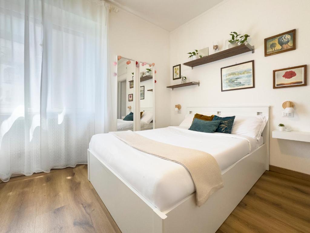 Postel nebo postele na pokoji v ubytování The cozy apartment - Turro M1