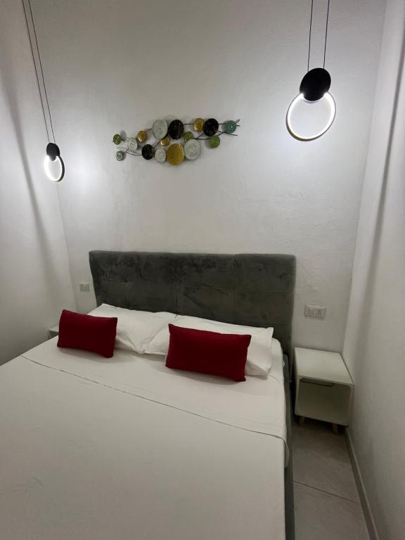 Łóżko lub łóżka w pokoju w obiekcie B&B Regina Rooms