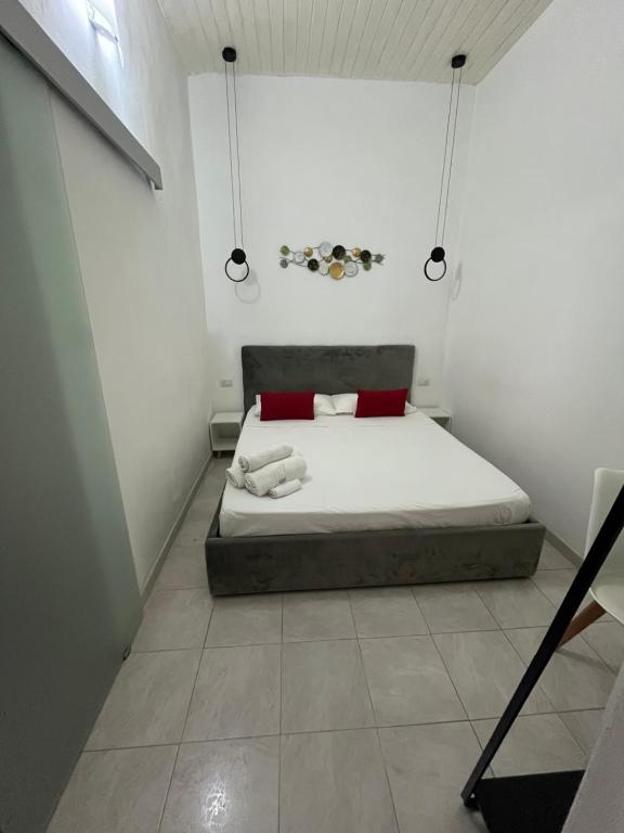 Łóżko lub łóżka w pokoju w obiekcie B&B Regina Rooms