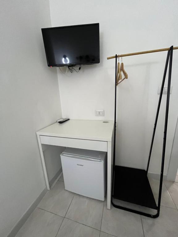 Telewizja i/lub zestaw kina domowego w obiekcie B&B Regina Rooms