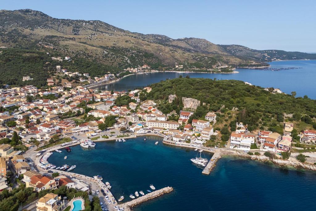 an aerial view of a small harbor in a bay at Villa Moyria by PosarelliVillas in Kassiopi