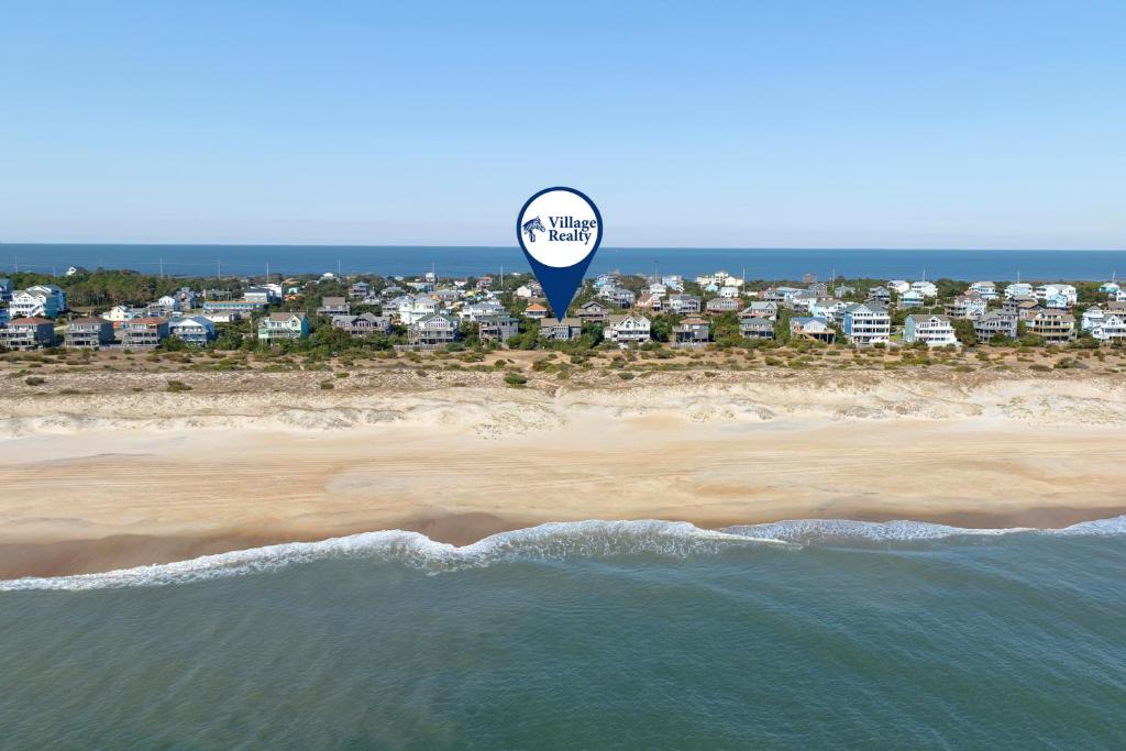 a hot air balloon flying over the beach at Afterdune Delight in Salvo