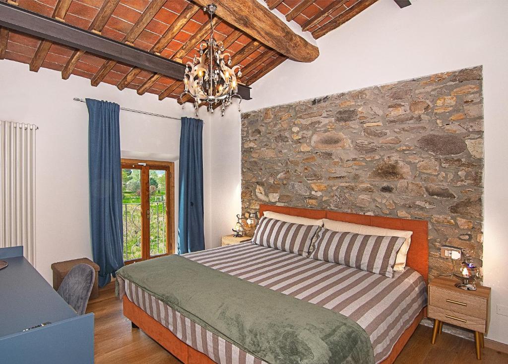 Postel nebo postele na pokoji v ubytování B&B Toringo