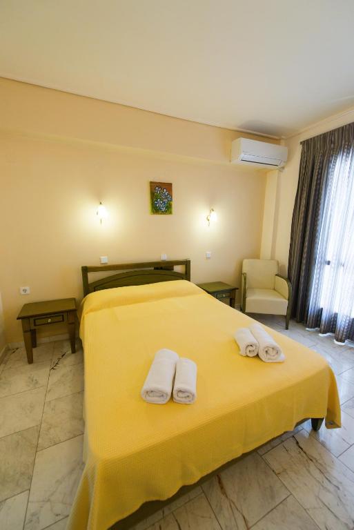 Postel nebo postele na pokoji v ubytování Hotel Niras