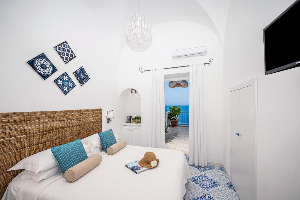 Postel nebo postele na pokoji v ubytování Casa Fioravante