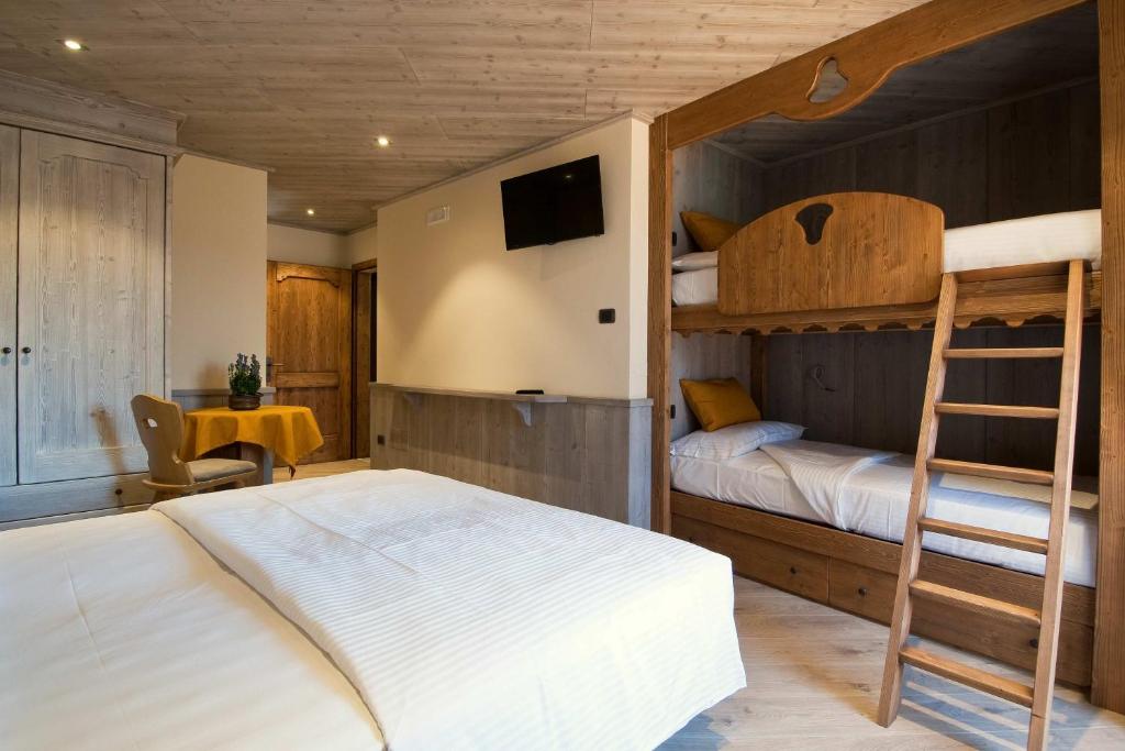 Posteľ alebo postele v izbe v ubytovaní Agritur Casa Fabri
