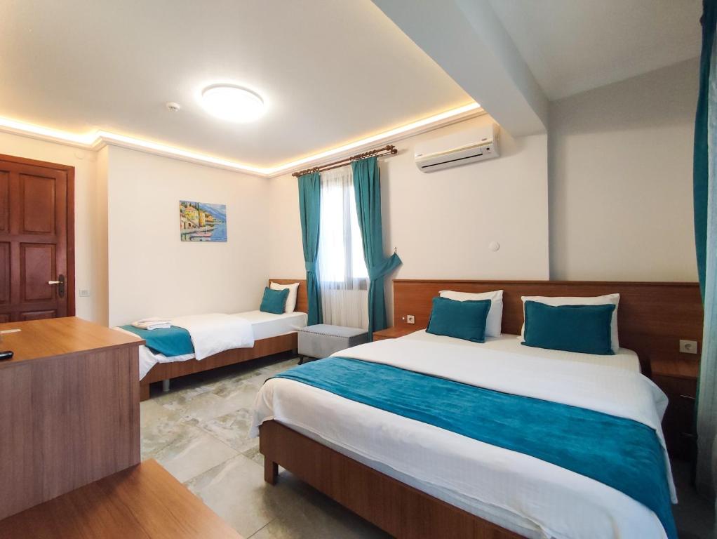 Postel nebo postele na pokoji v ubytování İskelem Otel