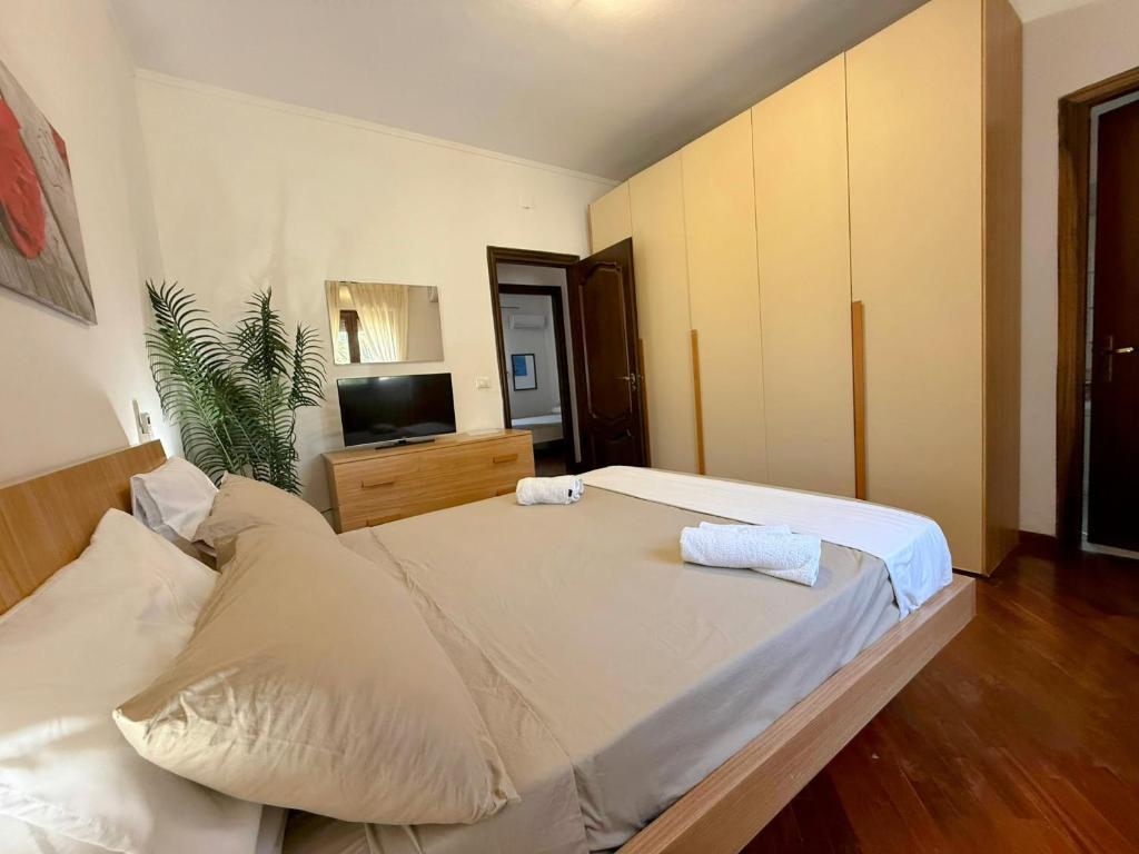 Postel nebo postele na pokoji v ubytování Casa vacanze Ciachea Home - Villa Accogliente con BBQ, Giardino e Parcheggio , A due Passi Da Palermo & Aereoporto