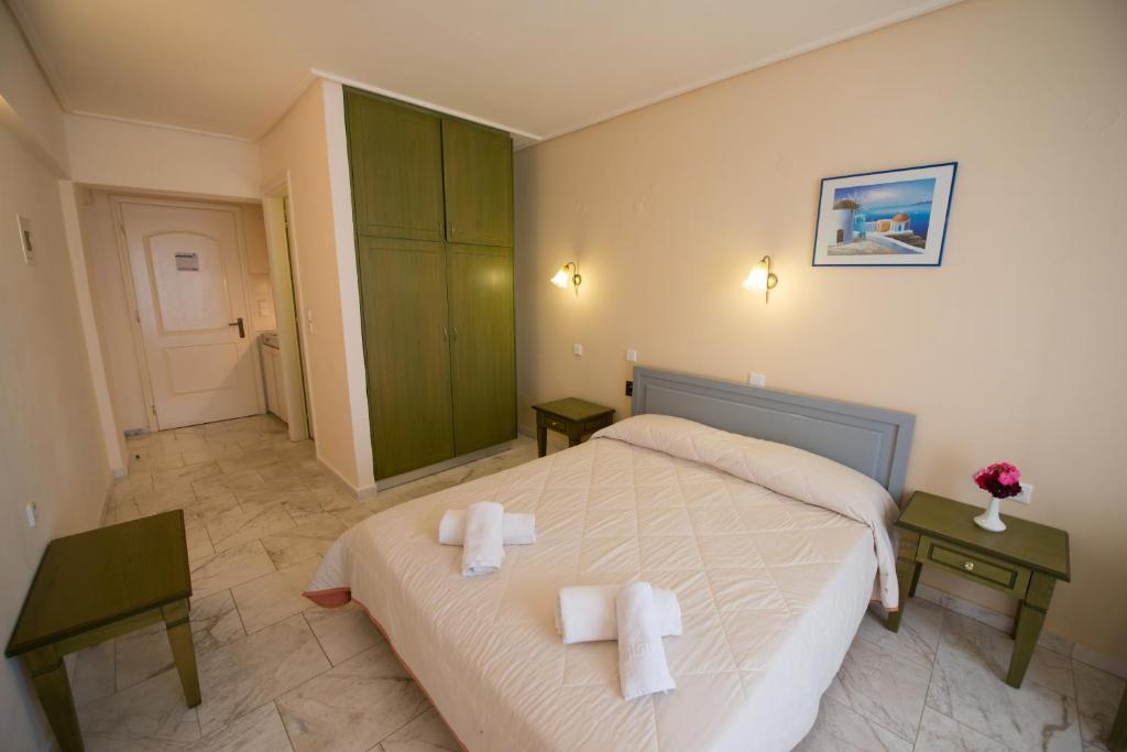 Postel nebo postele na pokoji v ubytování Hotel Niras