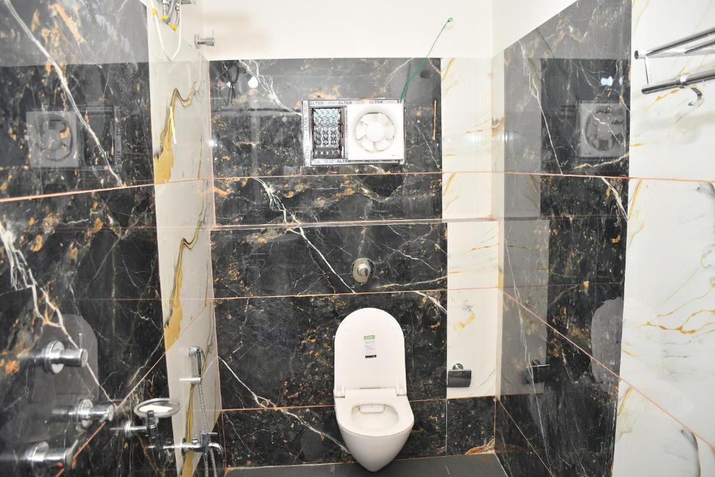 Koupelna v ubytování Hotel Ratneswar