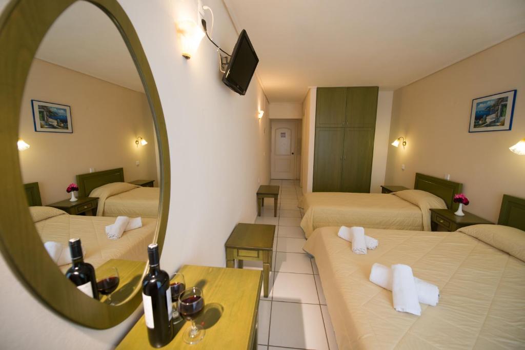 Postel nebo postele na pokoji v ubytování Hotel Niras