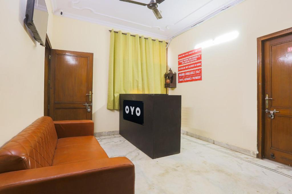 TV a/nebo společenská místnost v ubytování Hotel O JPS DC RESIDENCY