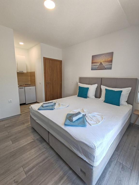 Postel nebo postele na pokoji v ubytování Apartments Kata