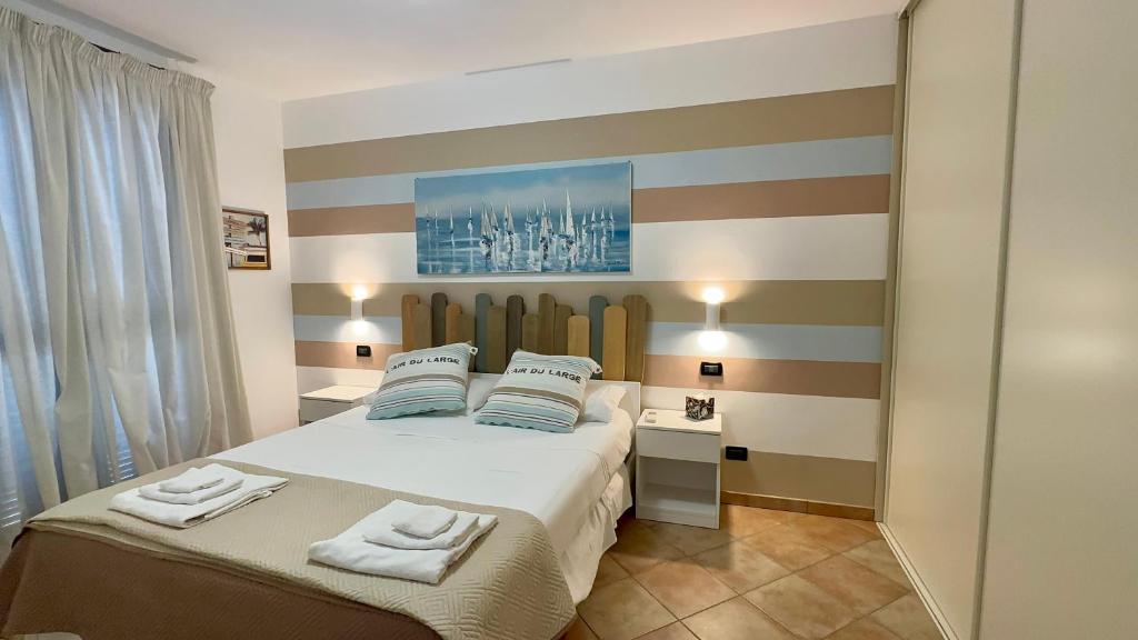 Ένα ή περισσότερα κρεβάτια σε δωμάτιο στο Casa del Grillo