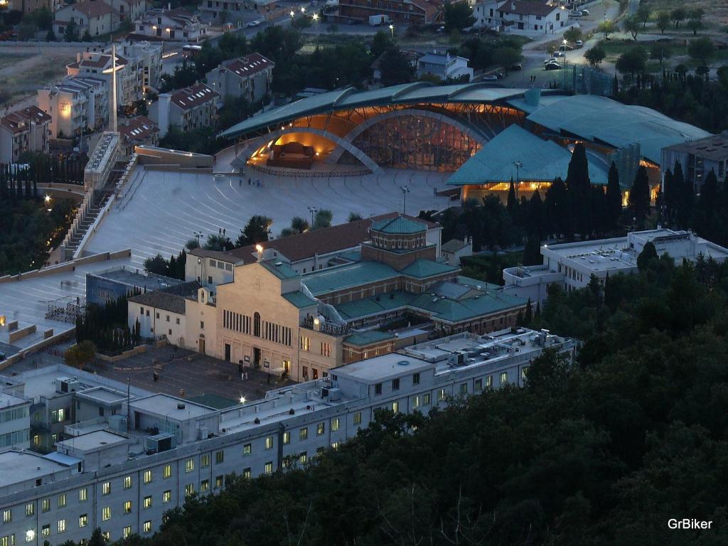 an aerial view of a city at night at B&B Antica Trattoria in San Giovanni Rotondo