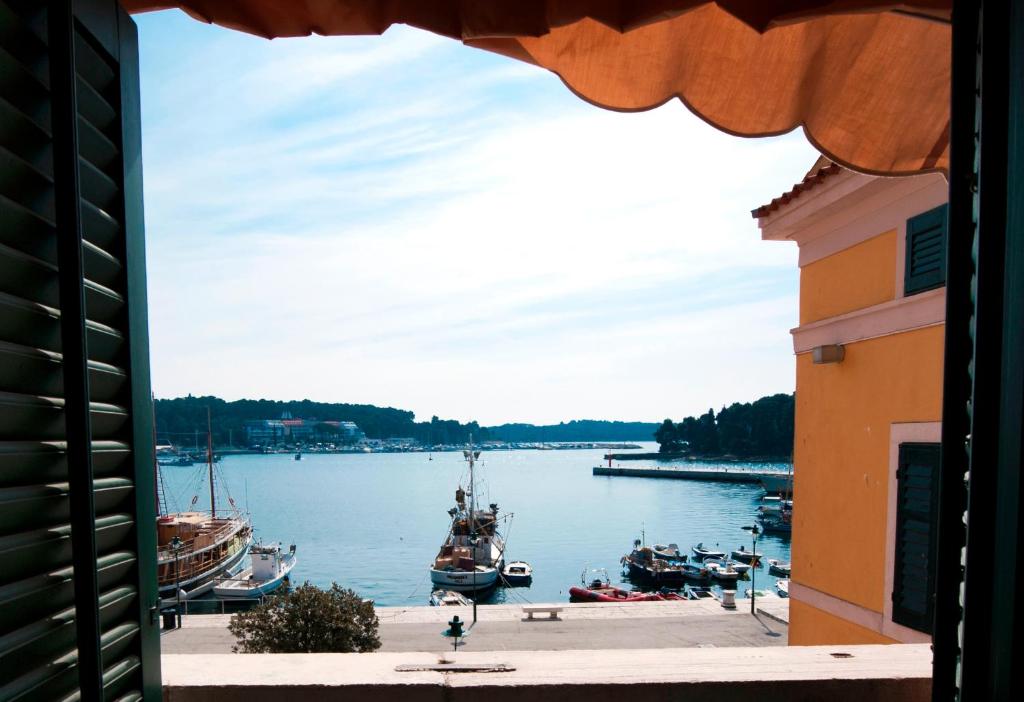 a view of a harbor with boats in the water at Apartment Al Porto in Rovinj