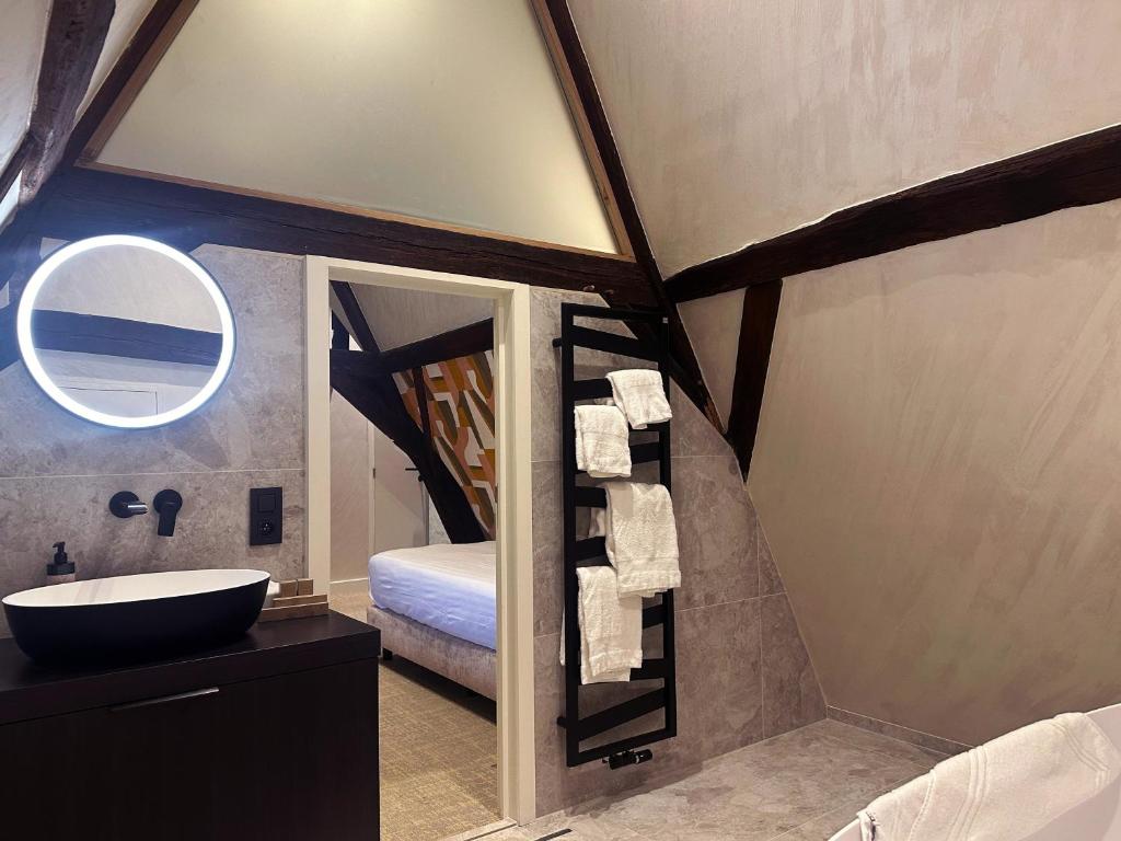 Postel nebo postele na pokoji v ubytování Van Der Valk Sélys Liège Hotel & Spa